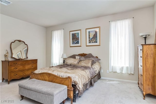 8275 Old Creek Ranch St, Las Vegas, NV 89139 - bedroom with multiple windows, light colored carpet, and baseboards