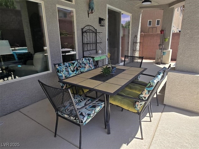 8275 Old Creek Ranch St, Las Vegas, NV 89139 - view of patio featuring a ceiling fan and outdoor dining space