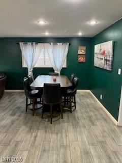 5804 Balzar Ave, Las Vegas, NV 89108 - dining room with wood finished floors, baseboards, and recessed lighting