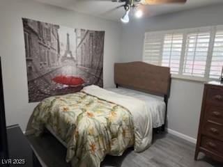 5804 Balzar Ave, Las Vegas, NV 89108 - bedroom featuring wood finished floors, baseboards, and a ceiling fan