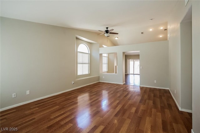 3416 Steppe St, North Las Vegas, NV 89032 - spare room featuring a ceiling fan, vaulted ceiling, baseboards, and dark wood-style floors