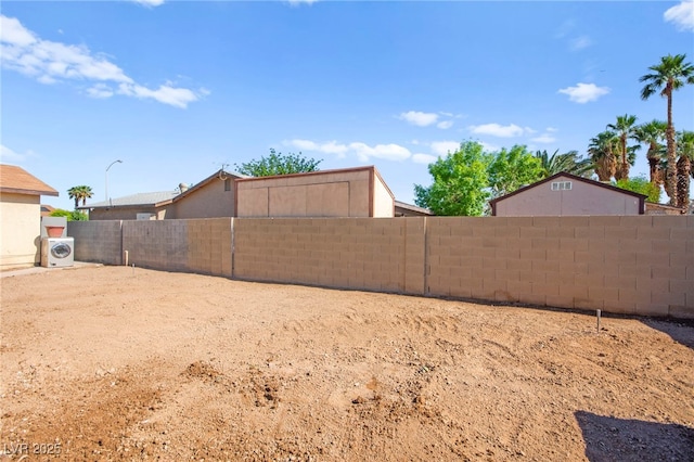 251 Las Palmaritas Dr, Las Vegas, NV 89110 - fenced backyard with a cooling unit