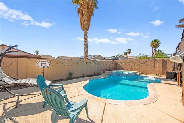 251 Las Palmaritas Dr, Las Vegas, NV 89110 - view of swimming pool featuring a fenced backyard, a patio, and a pool with connected hot tub