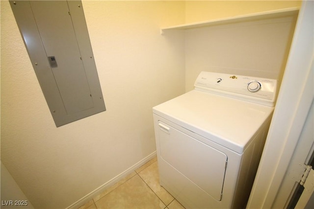 62 E Serene Ave Unit 129, Las Vegas, NV 89123 - washroom with washer / dryer, electric panel, light tile patterned floors, and baseboards