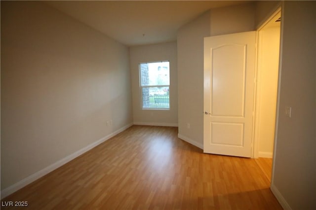 62 E Serene Ave Unit 129, Las Vegas, NV 89123 - empty room with light wood-style flooring and baseboards