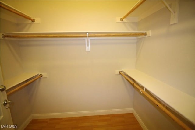 62 E Serene Ave Unit 129, Las Vegas, NV 89123 - spacious closet featuring light wood-type flooring