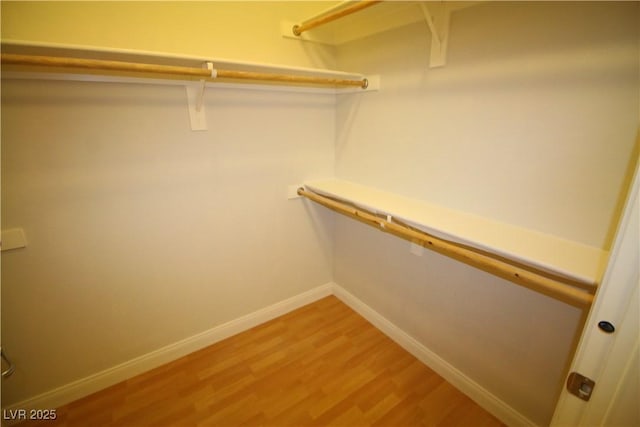 62 E Serene Ave Unit 129, Las Vegas, NV 89123 - spacious closet with light wood-type flooring