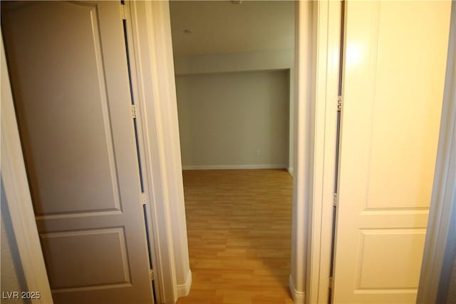 62 E Serene Ave Unit 129, Las Vegas, NV 89123 - corridor with light wood-style flooring and baseboards