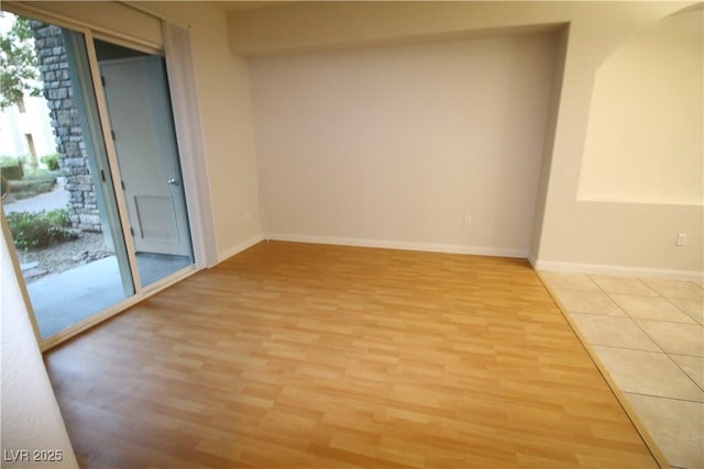 62 E Serene Ave Unit 129, Las Vegas, NV 89123 - empty room featuring light wood-type flooring and baseboards
