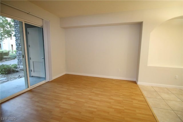 62 E Serene Ave Unit 129, Las Vegas, NV 89123 - unfurnished room featuring light wood finished floors and baseboards