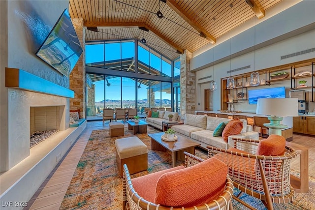 125 Mirage View Dr, Henderson, NV 89011 - building lobby featuring high vaulted ceiling, a sunroom, and beamed ceiling