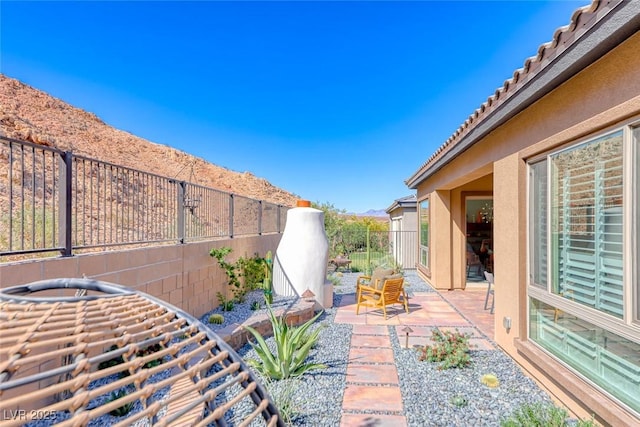125 Mirage View Dr, Henderson, NV 89011 - view of patio with a fenced backyard
