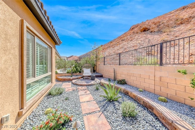 125 Mirage View Dr, Henderson, NV 89011 - fenced backyard with a patio