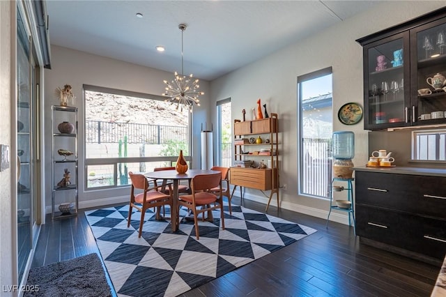 125 Mirage View Dr, Henderson, NV 89011 - dining area featuring baseboards, dark wood-style flooring, a chandelier, plenty of natural light, and recessed lighting