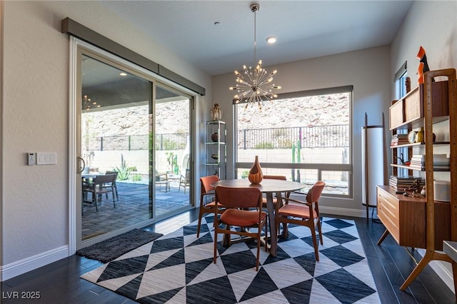 125 Mirage View Dr, Henderson, NV 89011 - dining room featuring a chandelier, baseboards, plenty of natural light, dark wood-type flooring, and recessed lighting