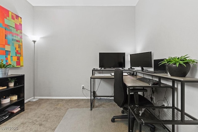 office space with carpet flooring and baseboards
