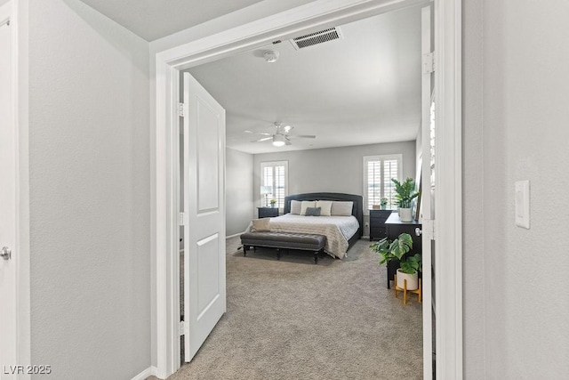 bedroom featuring carpet and a ceiling fan
