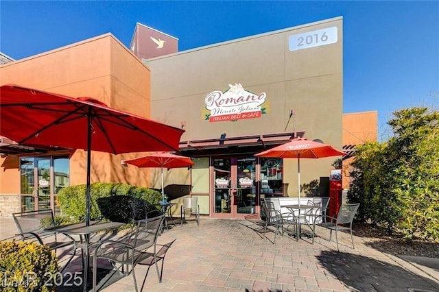 view of patio / terrace with french doors and outdoor dining area