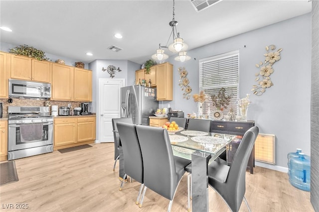7115 Hickory Post Ave, Las Vegas, NV 89179 - dining room featuring light wood-type flooring, recessed lighting, and baseboards