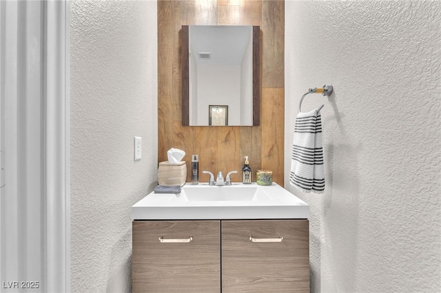 7115 Hickory Post Ave, Las Vegas, NV 89179 - bathroom featuring a textured wall and vanity