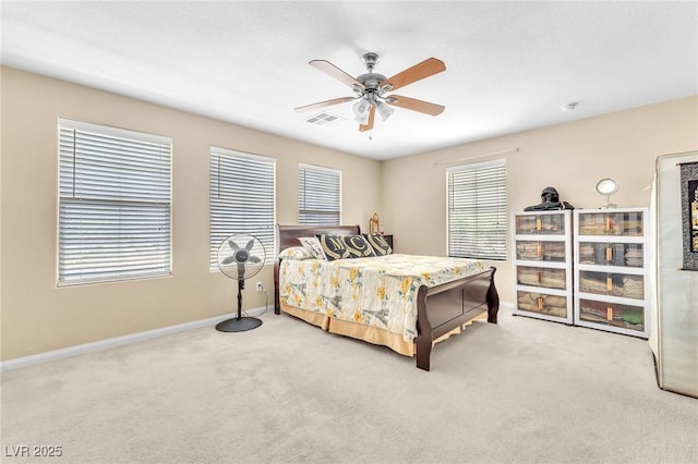 7115 Hickory Post Ave, Las Vegas, NV 89179 - bedroom with carpet flooring, multiple windows, baseboards, and ceiling fan