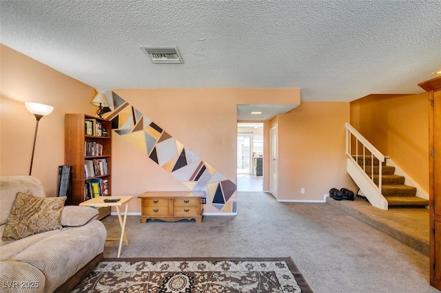 living area featuring stairs, carpet floors, a textured ceiling, and baseboards