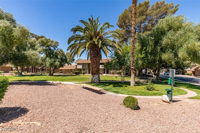 surrounding community with a yard