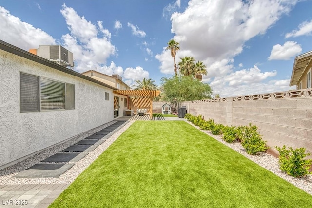 325 Heather Dr, Henderson, NV 89002 - view of yard featuring a pergola, a patio area, and central AC