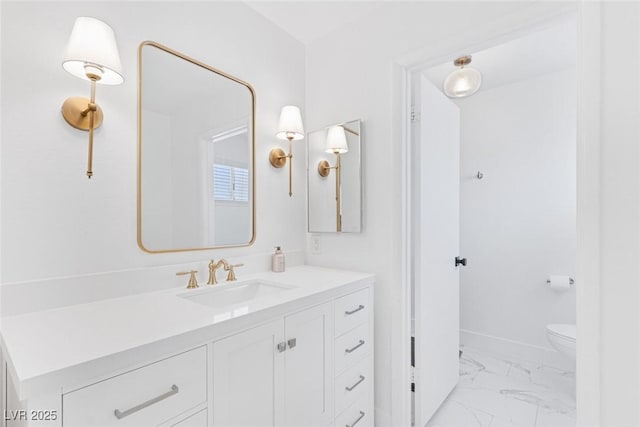 325 Heather Dr, Henderson, NV 89002 - bathroom featuring marble finish floors, vanity, and toilet