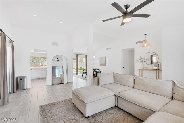 325 Heather Dr, Henderson, NV 89002 - living area with a ceiling fan, light wood-style flooring, recessed lighting, and high vaulted ceiling