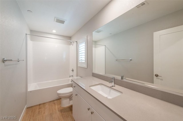 6145 May River St, Las Vegas, NV 89148 - full bath featuring toilet, wood finished floors, vanity,  shower combination, and recessed lighting
