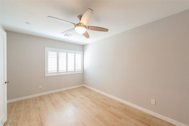 6145 May River St, Las Vegas, NV 89148 - unfurnished room featuring light wood-style flooring, baseboards, and a ceiling fan