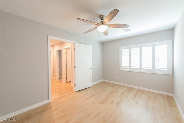 6145 May River St, Las Vegas, NV 89148 - unfurnished bedroom featuring light wood-style floors, baseboards, and ceiling fan