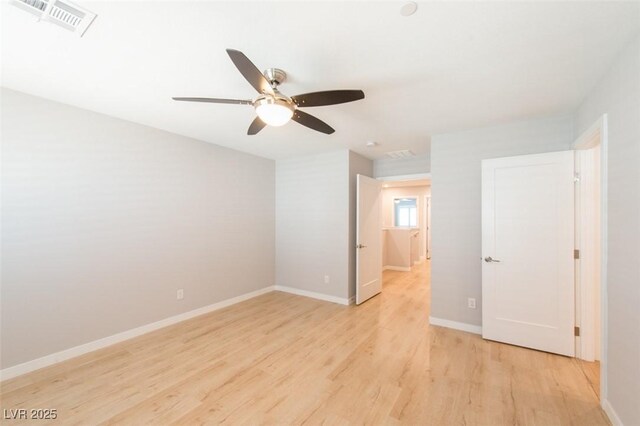 6145 May River St, Las Vegas, NV 89148 - unfurnished bedroom featuring light wood finished floors, baseboards, and a ceiling fan