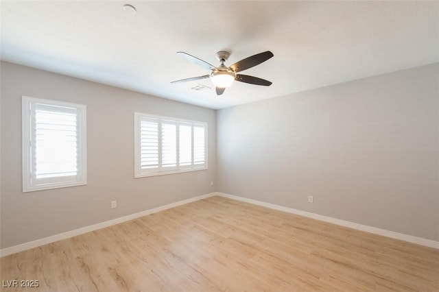 6145 May River St, Las Vegas, NV 89148 - unfurnished room featuring light wood-style flooring, a ceiling fan, and baseboards