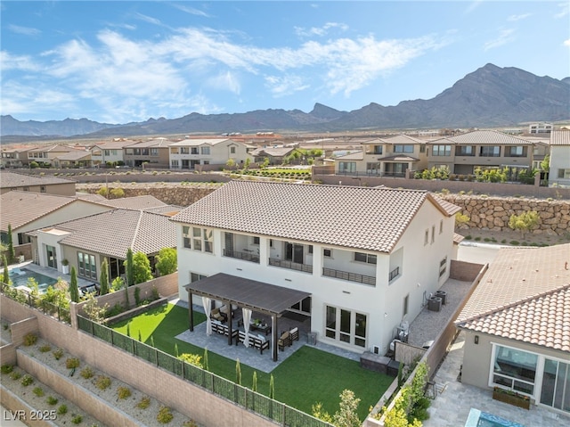 212 Harris Peak St, Las Vegas, NV 89138 - rear view of property with a residential view, a mountain view, a fenced backyard, and a patio area