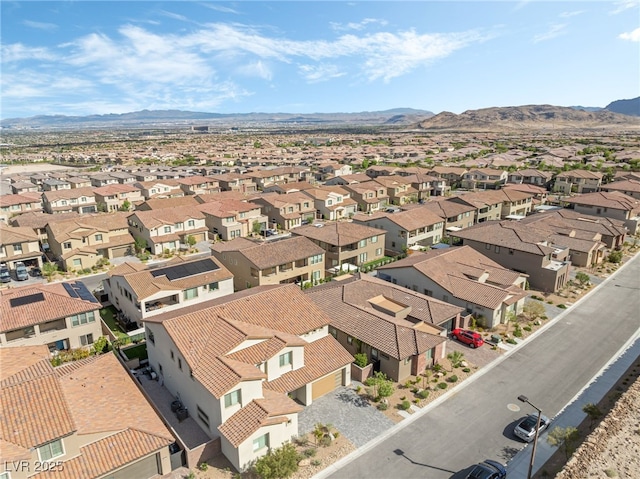 212 Harris Peak St, Las Vegas, NV 89138 - aerial view of residential area with a mountainous background