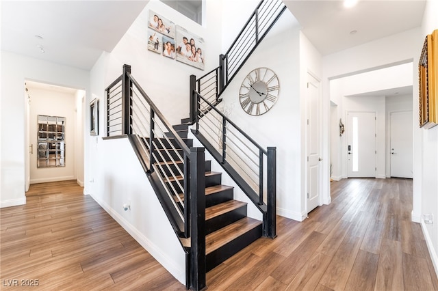 212 Harris Peak St, Las Vegas, NV 89138 - stairway featuring wood finished floors and baseboards