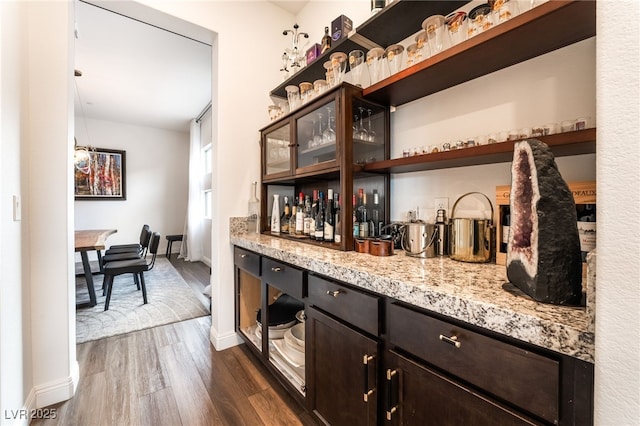 212 Harris Peak St, Las Vegas, NV 89138 - indoor dry bar featuring dark wood-type flooring