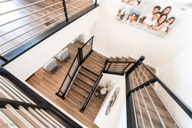 212 Harris Peak St, Las Vegas, NV 89138 - stairs featuring wood finished floors