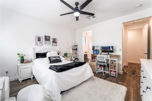 212 Harris Peak St, Las Vegas, NV 89138 - bedroom with dark wood-type flooring, ceiling fan, and connected bathroom