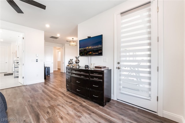 212 Harris Peak St, Las Vegas, NV 89138 - living area featuring wood finished floors, a ceiling fan, and recessed lighting