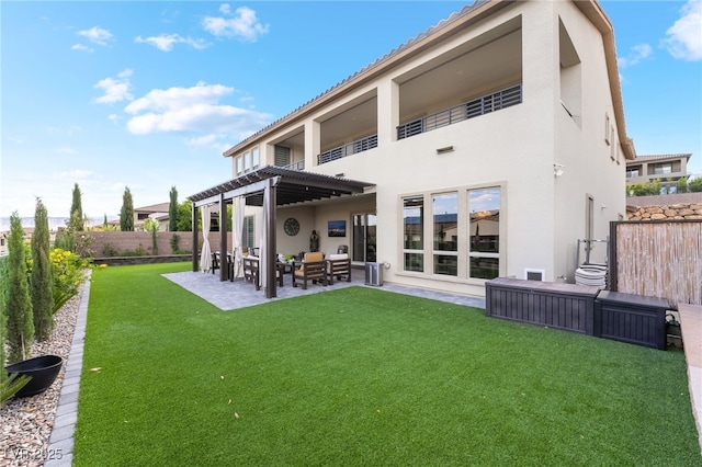 212 Harris Peak St, Las Vegas, NV 89138 - back of house featuring a fenced backyard, stucco siding, a patio, and a balcony