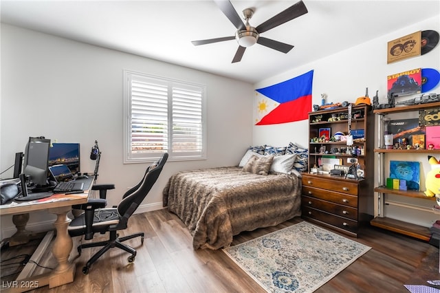 212 Harris Peak St, Las Vegas, NV 89138 - bedroom with a desk, wood finished floors, and a ceiling fan