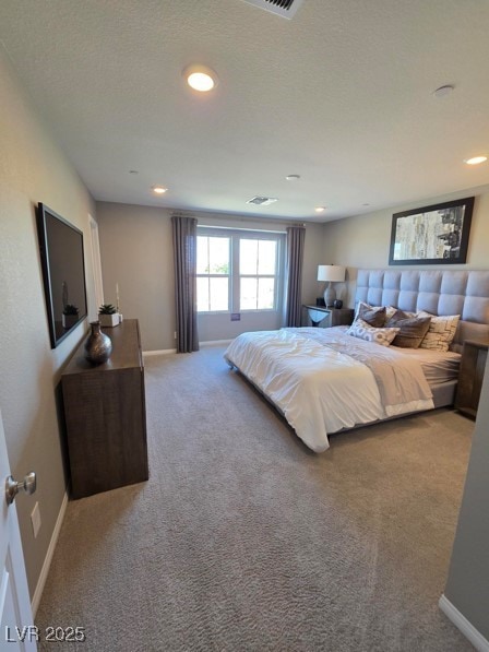bedroom with carpet, baseboards, and recessed lighting