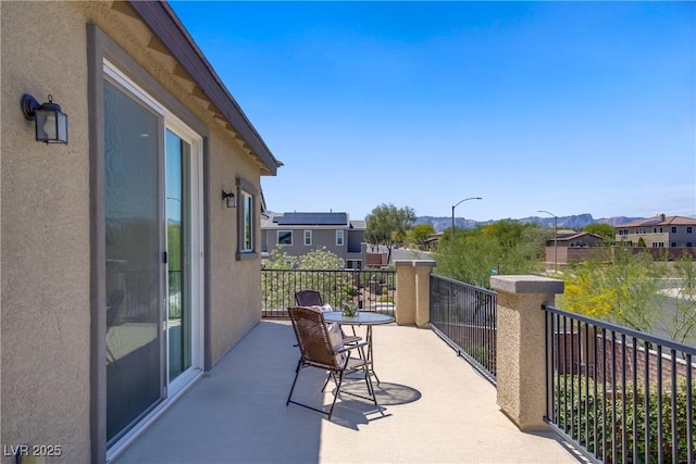 balcony featuring a residential view