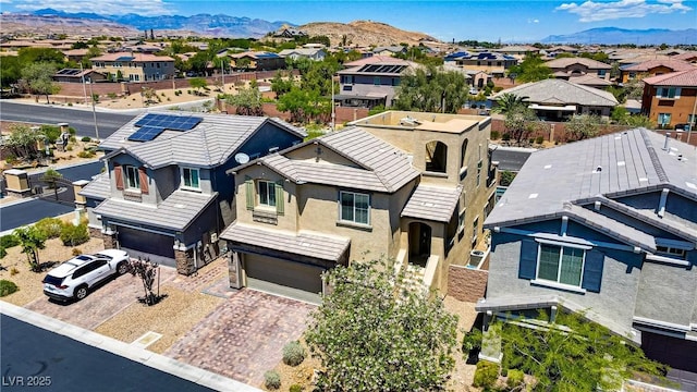 aerial perspective of suburban area featuring a mountainous background