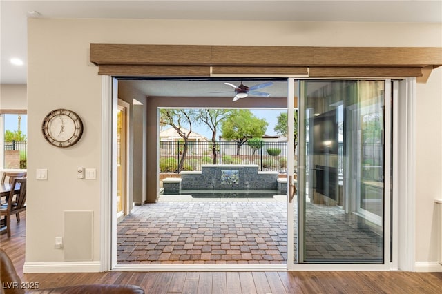 2116 Canvas Edge Dr, Henderson, NV 89044 - entryway with plenty of natural light, a ceiling fan, hardwood / wood-style floors, and baseboards