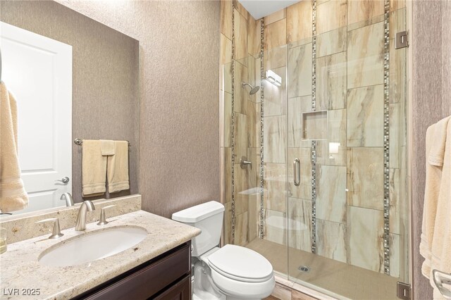 2116 Canvas Edge Dr, Henderson, NV 89044 - full bath with toilet, a shower stall, vanity, and a textured wall