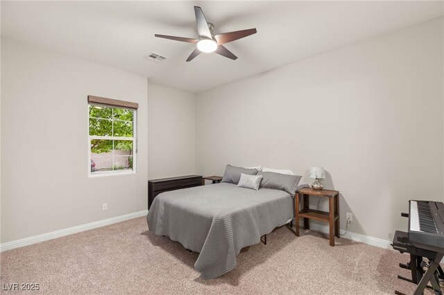 2116 Canvas Edge Dr, Henderson, NV 89044 - bedroom featuring baseboards, light colored carpet, and a ceiling fan